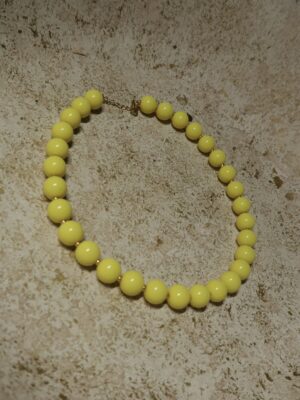 Gele ketting met ronde kralen